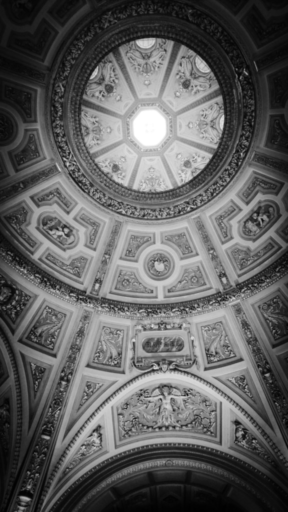 Urban photo - Vienna, Austria. 'Kunsthistorisches Museum Cafe.'  The ceiling of this impressive cafe and restaurant. Built in the late 19th century, the art museum and its cafe epitomizes Austro-Hungarian imperial elegance. Be aware the queue to get in, especially around Christmas time, can be large. sketchbookexplorer.com @davidasutton @sketchbookexplorer Facebook.com/davidanthonysutton #photograph #b&w #vienna #travel #travelblog #kunsthistorischesmuseum