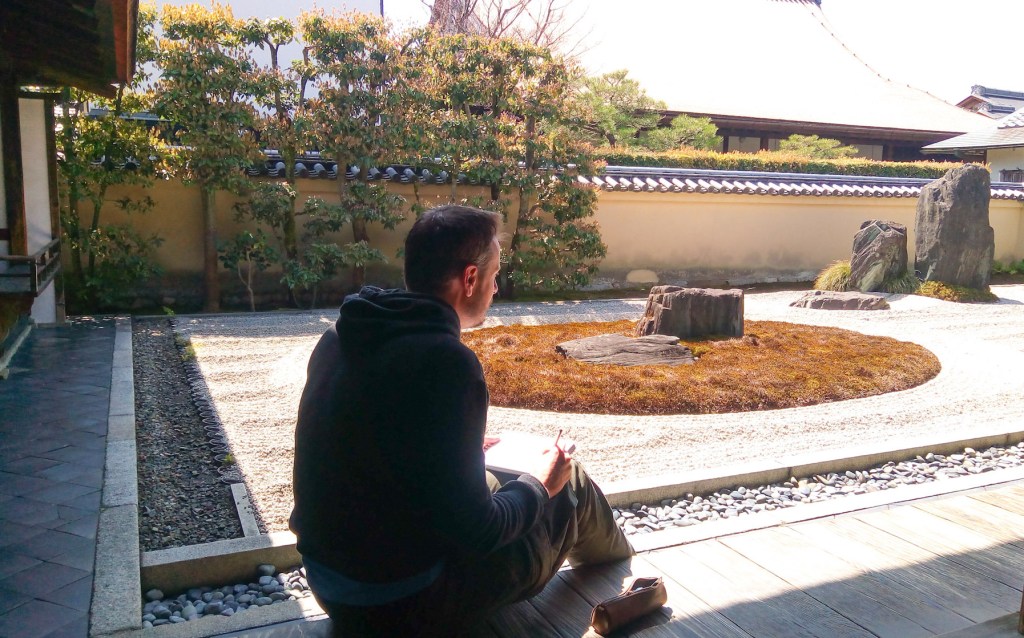Photo of artist sketching in Ryogen-in Temple, Kyoto