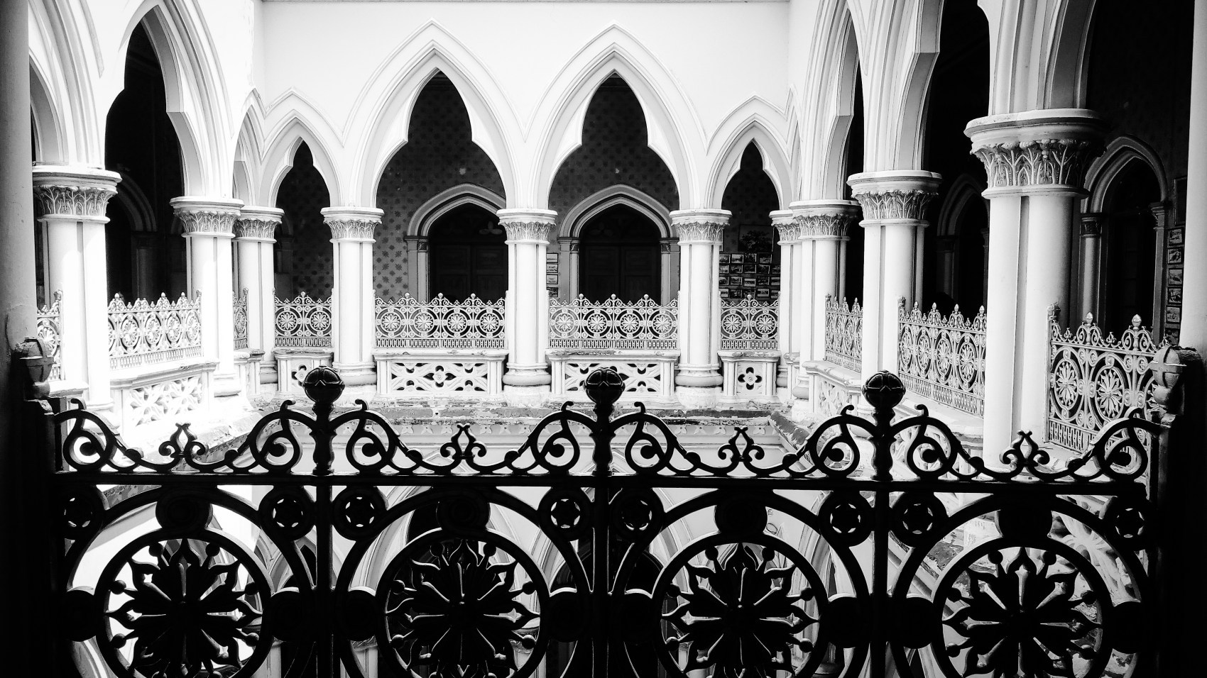 Urban photo – Vasanth Nagar, Bengaluru, Karnataka, India. ‘Bangalore Palace.' This palace was built in the 1870s, for the then young Maharaja Jayachamaraja Wadiyar, by his guardian Rev. Garrett. The estate is currently owned by the daughters of the last Maharaja of Mysore Jayachamaraja Wadiyar. sketchbookexplorer.com @davidasutton @sketchbookexplorer Facebook.com/davidanthonysutton #photograph #photography #blackandwhite #bangaluru #karnataka #palace #mysoreroyalty #bangalorepalace #maharaja #travel #travelblog #india